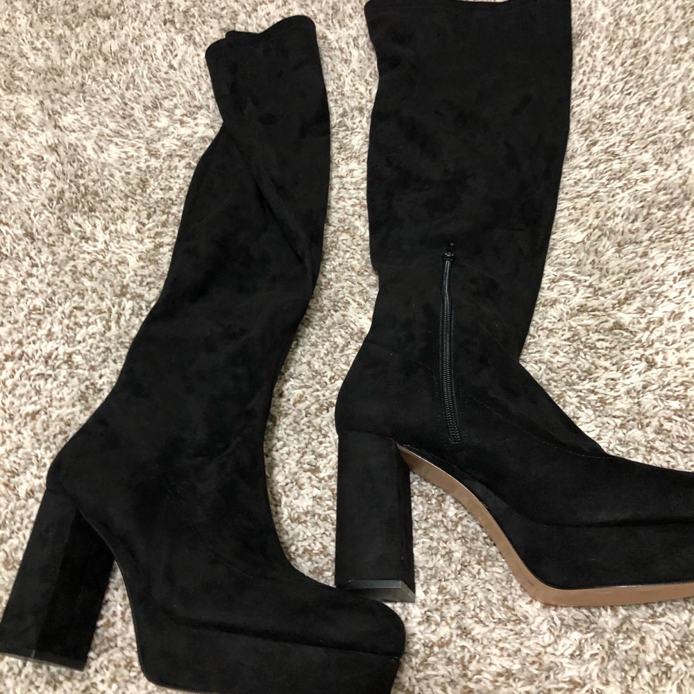Black knee high high heeled boots